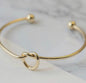 Bracciale rigido con nodo